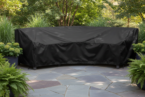 black L outside cover for L shaped object in garden or patio setting